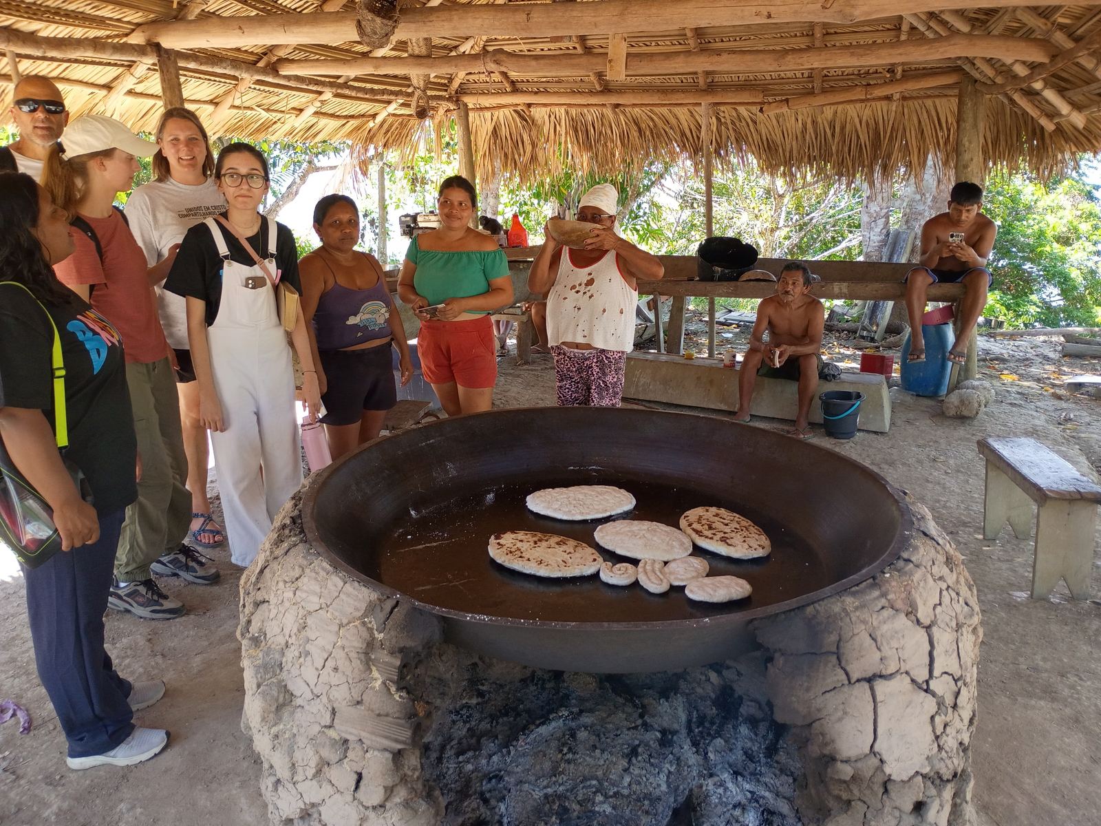 Cooking flatbread on a clay stove in Brazil